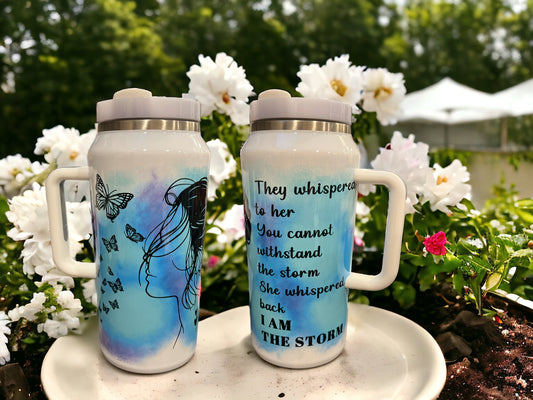 64oz Stanley Style Thirst Quencher- they whispered to her you cannot withstand the storm. She whispered back I am the storm. 